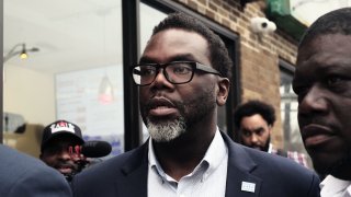 CHICAGO, IL – APRIL 04: Chicago mayoral candidate Brandon Johnson leaves after campaigning at Manny’s Cafeteria & Delicatessen during the mayoral runoff election at Robert Healy Elementary School on April 4, 2023 in Chicago, Illinois. Chicago mayoral candidates Brandon Johnson, a Cook County commissioner, and former Chicago Public Schools CEO Paul Vallas are facing off in a runoff election for the mayor’s office. (Photo by Alex Wroblewski/Getty Images)