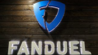 A sign hangs on the wall in the reception area at FanDuel Inc.’s offices in Edinburgh, U.K., Feb. 7, 2017.