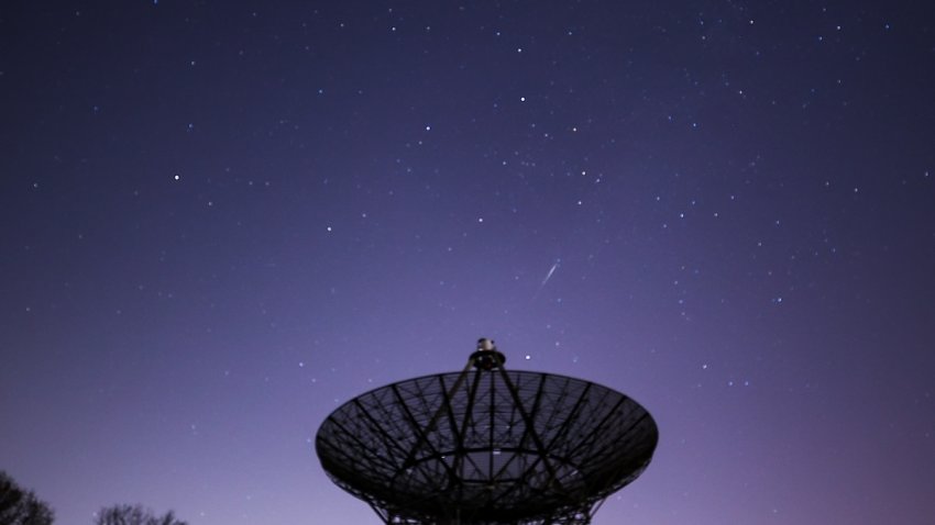 A meteor streaks across the night sky at the InfoAge Space Exploration Center in Wall Township of New Jersey, United States as the Lyrids meteor shower reached its maximum in the early morning of April 22, 2022.