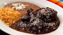 Mole Poblano with rice and beans.